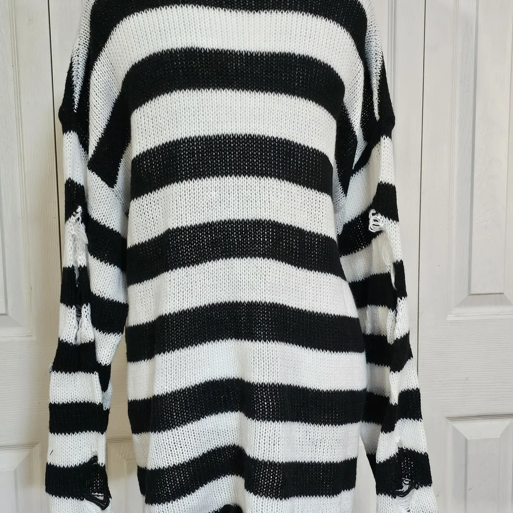 Black & White Striped Oversized Sweater with Cross Detail - Picture 6 of 6